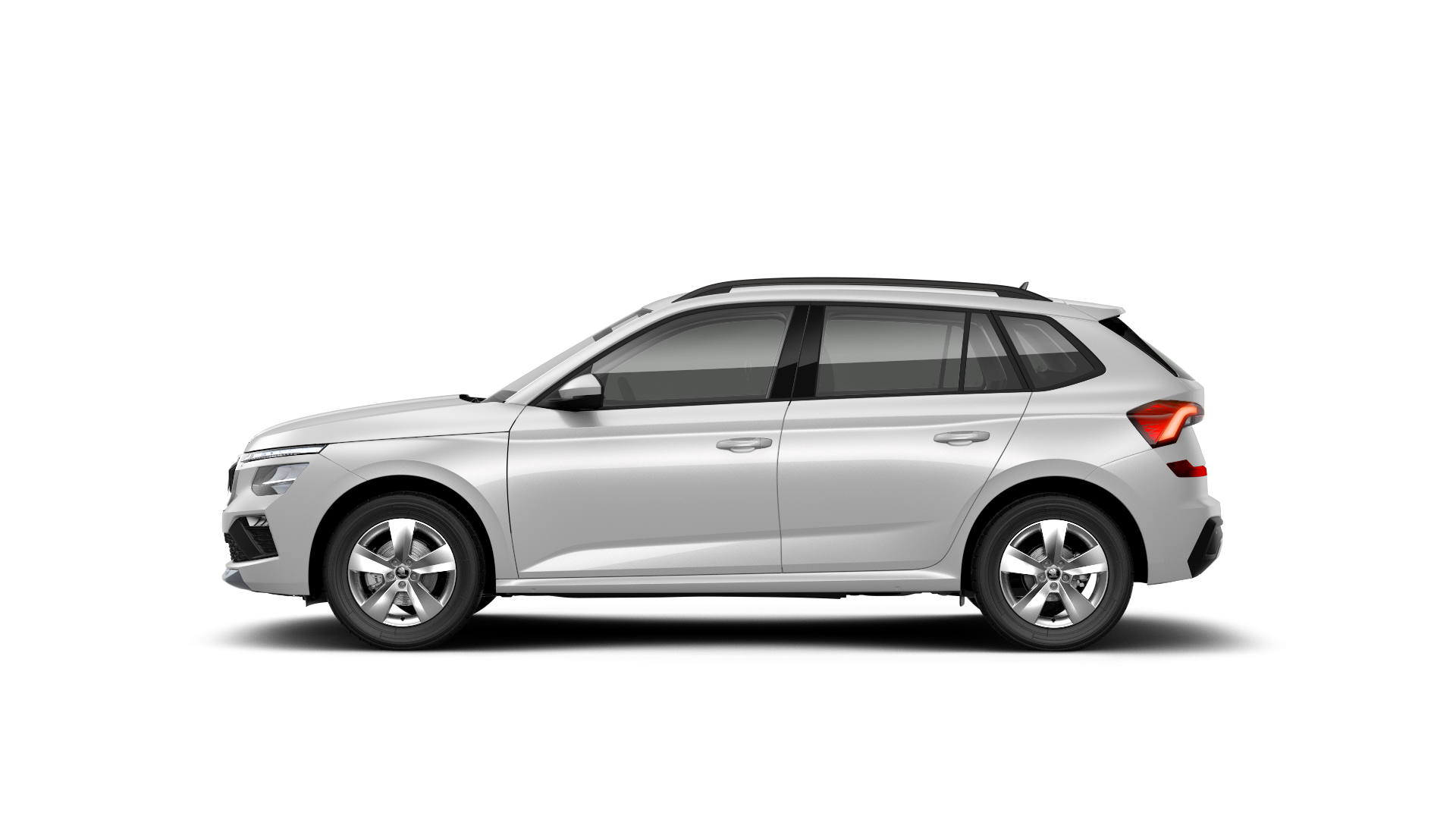 Bel športni terenec, viden s strani. Avto je srednje velik, z modernim, elegantnim dizajnom. Opremljen je s petimi vrati.